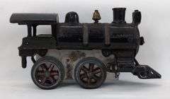 Prewar cast Iron O Gauge key wind steam locomotive with snap in motor