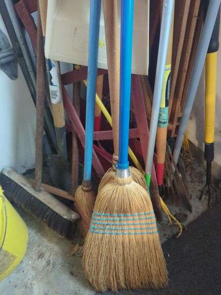 Collection of Brooms, Rakes, Shovels, and Cleaning Tools