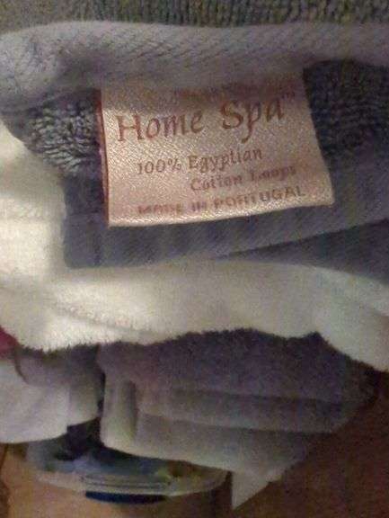 contents of Linen Cabinet with Linens and towels