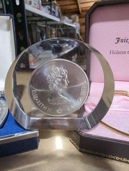 Kirk Pewter Necklace, 1973 Canadian Dollar Display, and Juicy Couture Bracelet