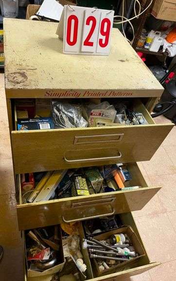 Simplicity three-Drawer Cabinet with Assorted Contents