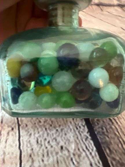 Flour dis lis bottle with marbles