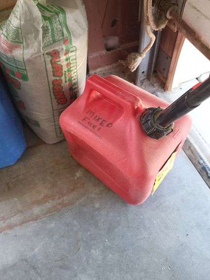 Mixed Lot: TIko All Purpose Cleaner, Play Sand, and Gas Cans