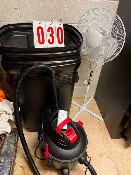 Shop Vacuum, Storage Container, Fan, and Assorted Shelf Items