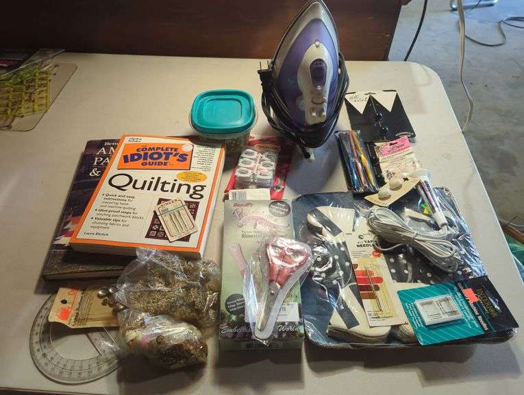 Quilting and Sewing Lot with Books, Supplies, and Iron