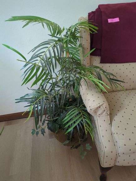 Upholstered Wingback Chair with Plant and Magazine Rack