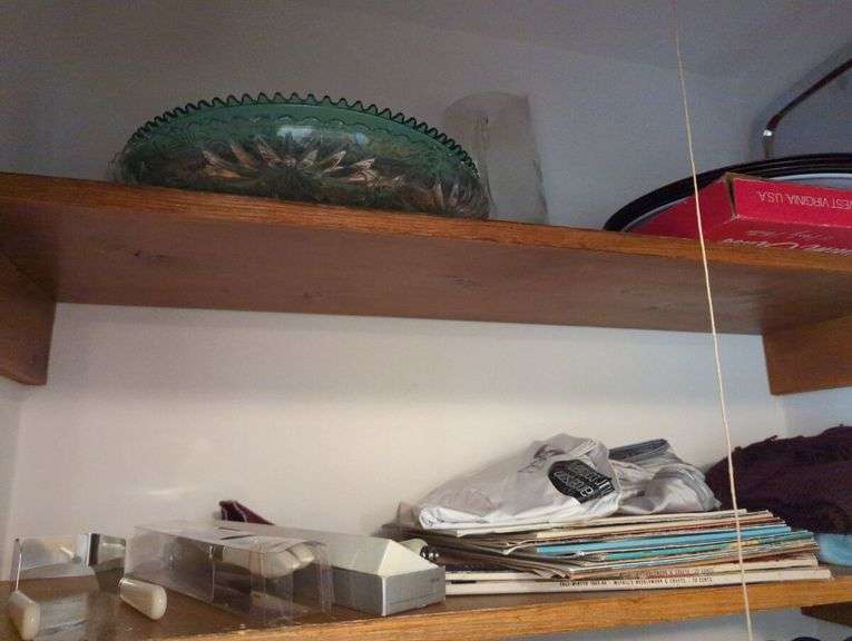 Assorted Closet Items: Clothing, Storage, and Collectibles