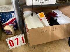 Storage Shelves with Assorted Household and Automotive Items