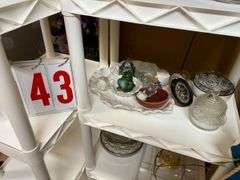 Shelf with Assorted Glassware and Home Decor Items