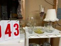 Shelf with Assorted Glassware and Home Decor Items