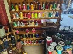 Large Lot of Sewing and Embroidery Thread with Racks