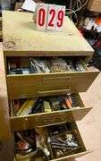 Simplicity three-Drawer Cabinet with Assorted Contents