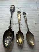 Pair of Weighted Silver Candlestick Holders and Souvenir Spoons