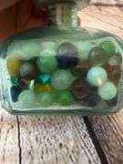 Flour dis lis bottle with marbles