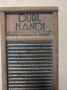 Collection of Early Household Items: Washboard, Butter Churn, Clock, and More