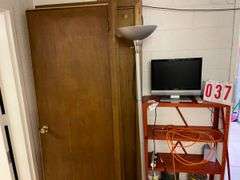 Assorted Household Items: 2 doors, Shelving Unit, Television, and Floor Lamp