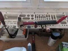 Contents of workbench, barn, lantern, ground clear, air station, toolbox, Tonka trucks, and more