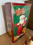 Jingle Bell Rock Santa Figure and Electric Holiday Candles