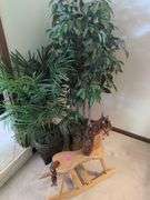 Potted Plants and Wooden Rocking Horse