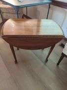 Upholstered Accent Chair with Assorted Tables and Framed Art