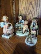 Three Goebel Hummel Figurines: "Mail", "Ride", and "Scout"