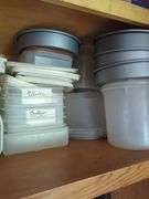 Collection of Kitchen Storage Containers, Jars, and Baking Pans