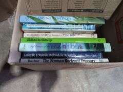 Boxes of Media and Books: Cassettes, VHS Tapes, DVDs, and Assorted Books