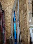 Building and Construction Tool Lot: Empire Level, Conduit, Measuring Stick, and More