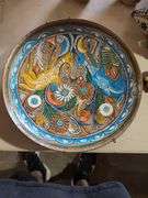 Hand-Painted Decorative Plate with Various Decorative Items