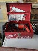 Milwaukee Heavy Duty screw driver in Red Metal Case with Accessories