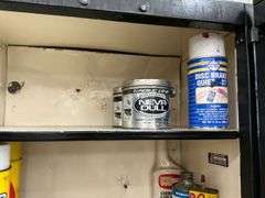 Garage Cabinet of Supplies - Caulking, Cleaners, Lubricants, Repair Items