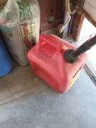Mixed Lot: TIko All Purpose Cleaner, Play Sand, and Gas Cans