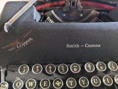 Smith Corona Clipper Typewriter with Case