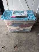 Tote of tablecloths and textiles