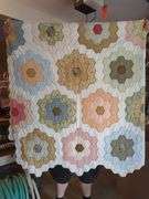 Handmade Quilt with Floral Hexagon Pattern