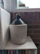 Collection of Books, Stoneware Jugs, and Decorative Storage Box