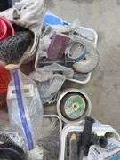 Assorted Power Tool Accessories: Grinding Wheels, Brushes, and More