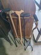 Variety of Walking Canes with Carved Details and Adjustable Models