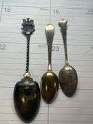 Pair of Weighted Silver Candlestick Holders and Souvenir Spoons