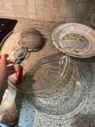 Mixed Kitchen Lot: Pyrex Bowls, Apple Pie Plate, and Strainers