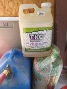 Mixed Lot: TIko All Purpose Cleaner, Play Sand, and Gas Cans