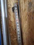 Building and Construction Tool Lot: Empire Level, Conduit, Measuring Stick, and More