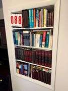 Bookshelf Collection of Various Books and Reference Materials