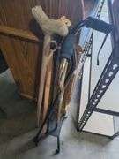 Variety of Walking Canes with Carved Details and Adjustable Models